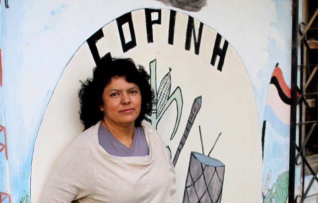 Berta Caceres stands at the COPINH (the Council of Popular and Indigenous Organizations of Honduras) offices in La Esperanza, Intibucá, Honduras where she, COPINH have organized a two year campaign to halt construction on the Agua Zarca Hydroelectric project, that poses grave threats to Rio Blanco regional environment, river and indigenous Lenca people.